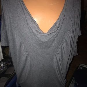 Gathered in the v are gray top. ROOMY